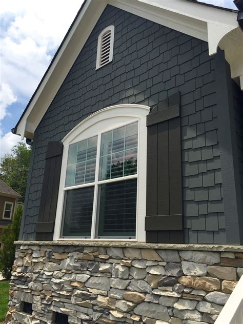 dark grey house with metal roof|grey houses with black shutters.